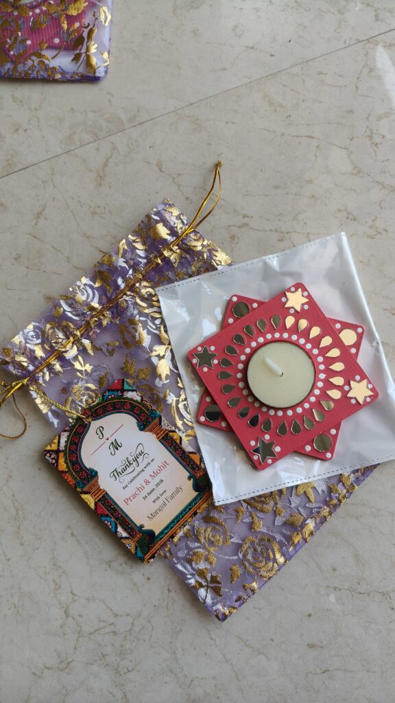 Handmade pink star tea light holder wedding favours in a lavender potli with customised thank you card. Best wedding return gift option. Handmade with love by KaushalS Creations