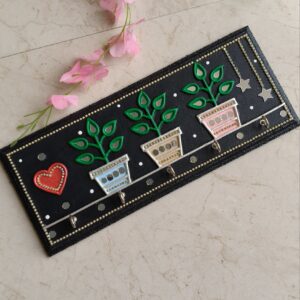 Mini garden key holder for wall with colourful pots and green leaf design. Handcrafted by KaushalS Creations